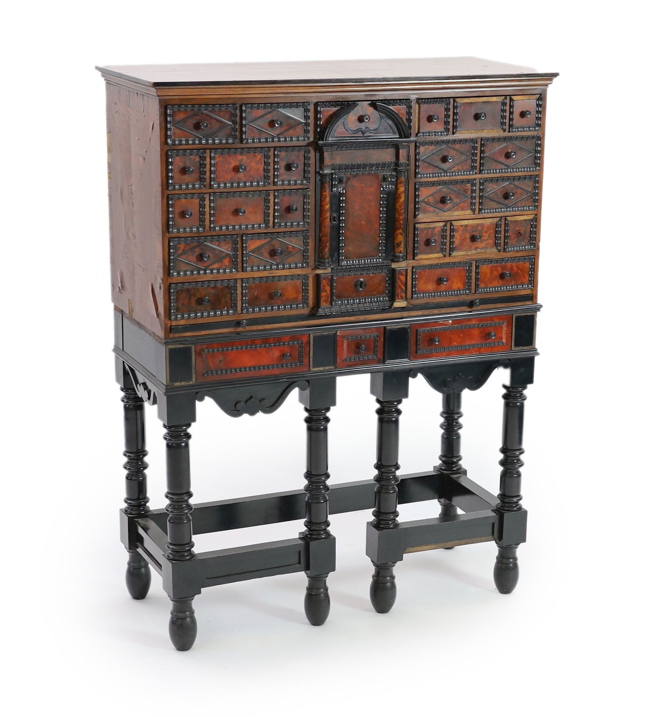 A 17th century Flemish style ebony and tortoiseshell cabinet on stand, width 99cm depth 42cm height 131cm